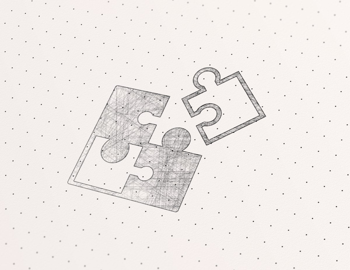 Early hand-drawn concept sketch of the puzzle icon