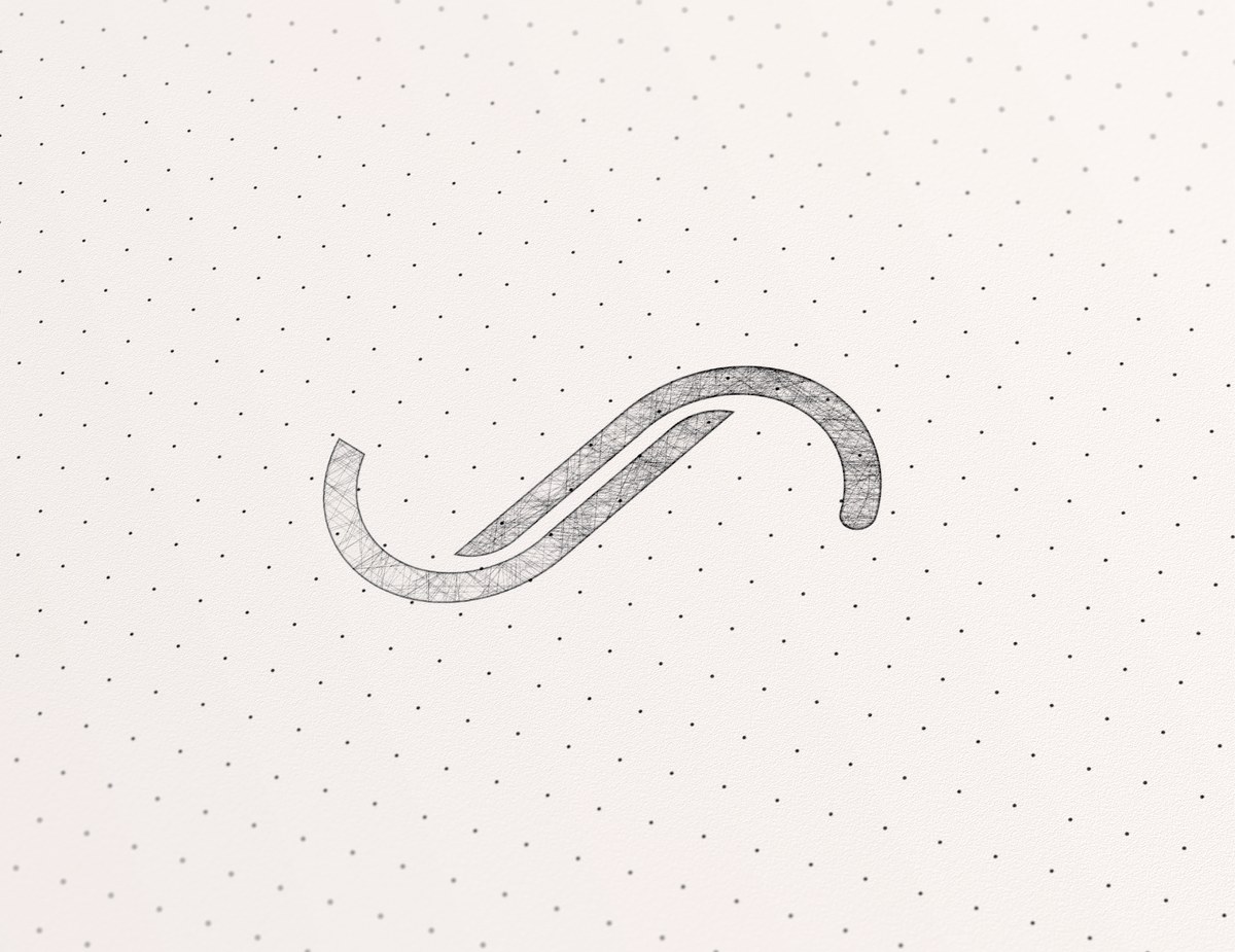 Early hand-drawn concept sketch of the Justsudz monogram