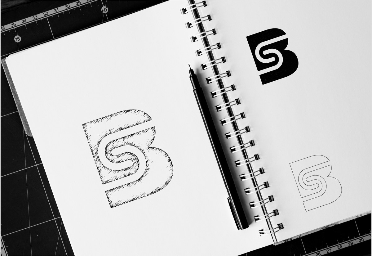 Early hand-drawn concept sketch of the Shami.B monogram
